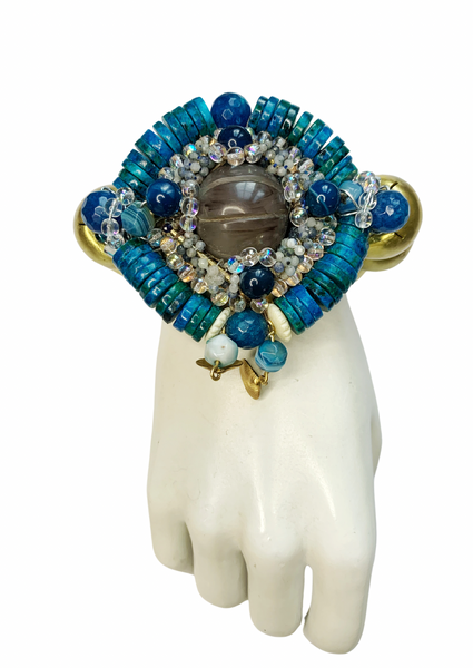 Ocean Radiance Blue Chrysocolla, Agate, Lapis Lazuli, Faceted Glass and Sodalite Stone, Brass Statement Bracelet with Shell
Charms