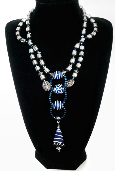 Ratih Double Strand Silver Hematite Necklace With Faceted Crystal Glass Bead and Decorative Blue Lampwork Pendant Drops