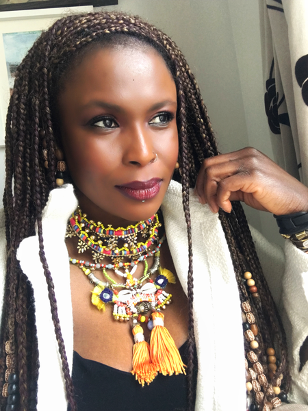Ijele Multi Glass-Beaded Embellished Metal and Cowrie Shells Pendant Necklace with Jumbo Orange Tassels.