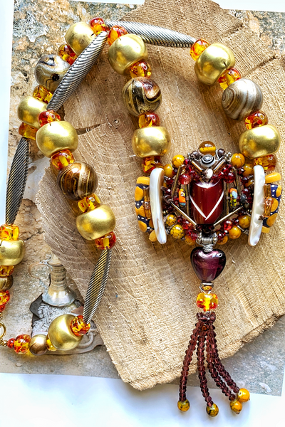 The Ifedika Multi-Beaded Bohemian Statement Necklace with Heart Glass Accents and Beaded Tassels