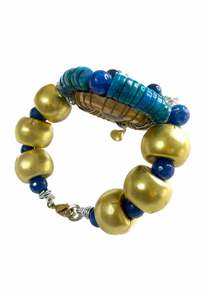 Ocean Radiance Blue Chrysocolla, Agate, Lapis Lazuli, Faceted Glass and Sodalite Stone, Brass Statement Bracelet with Shell
Charms