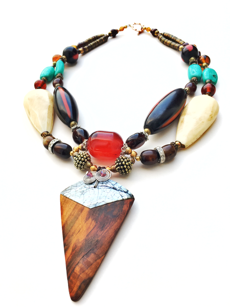 A Wooden Mother of Pearl Arrow Pendant Double Strand Necklace with Multicoloured Mixed Sized Beads