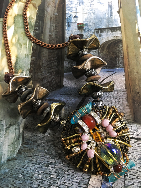 Elhum Long Multi-Beaded Necklace With Large Circular Embellished Pendant