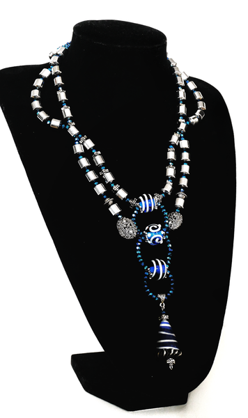 Ratih Double Strand Silver Hematite Necklace With Faceted Crystal Glass Bead and Decorative Blue Lampwork Pendant Drops